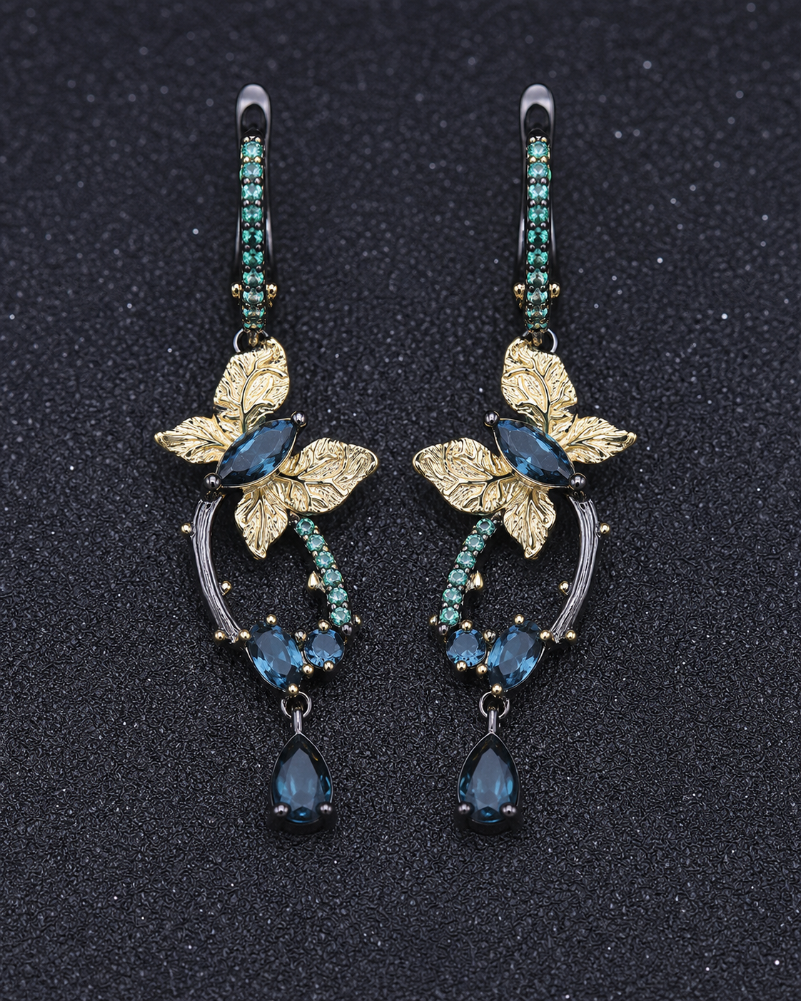Theiaura Nocturne Butterfly Drop Earrings in a contemporary jewelry scene