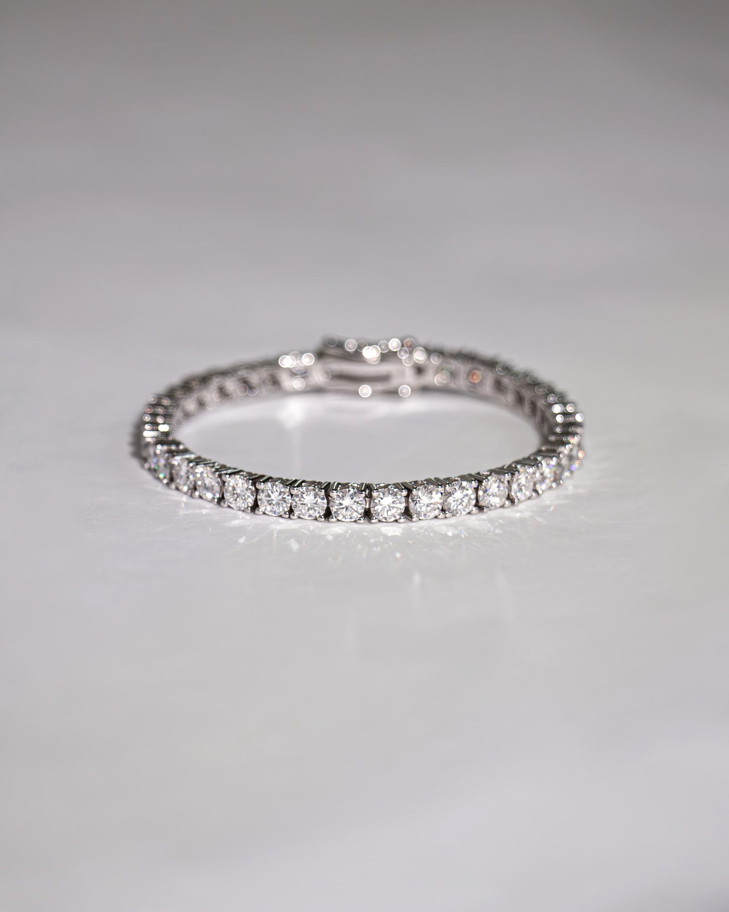 Theiaura 4-Prong Round Moissanite Tennis Bracelet - THEIAURA & CO.