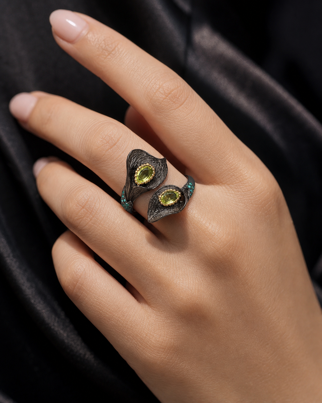 Theiaura Calla Bloom Ring in Natural Peridot worn on hand