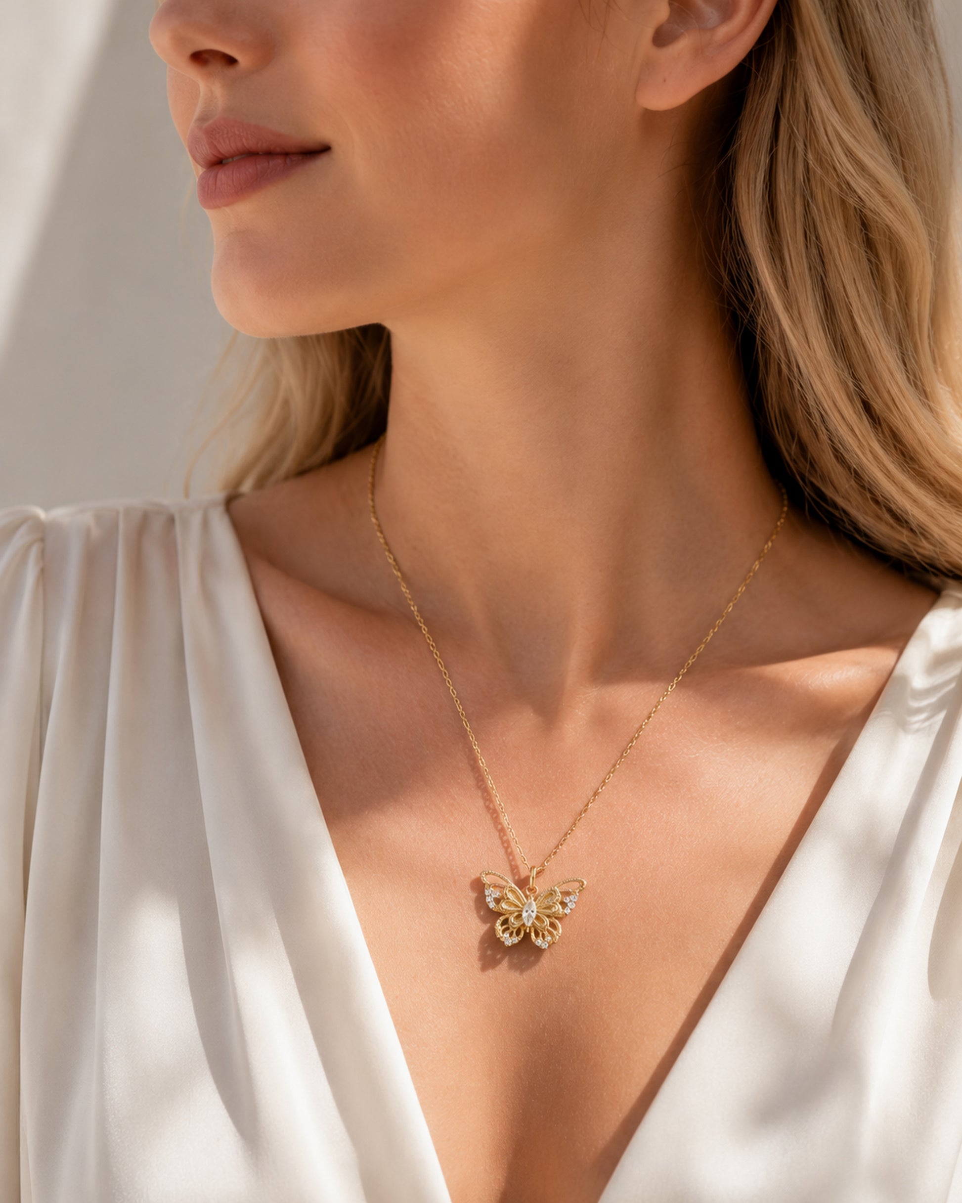 Theiaura Gilded Butterfly Pendant Necklace worn on model
