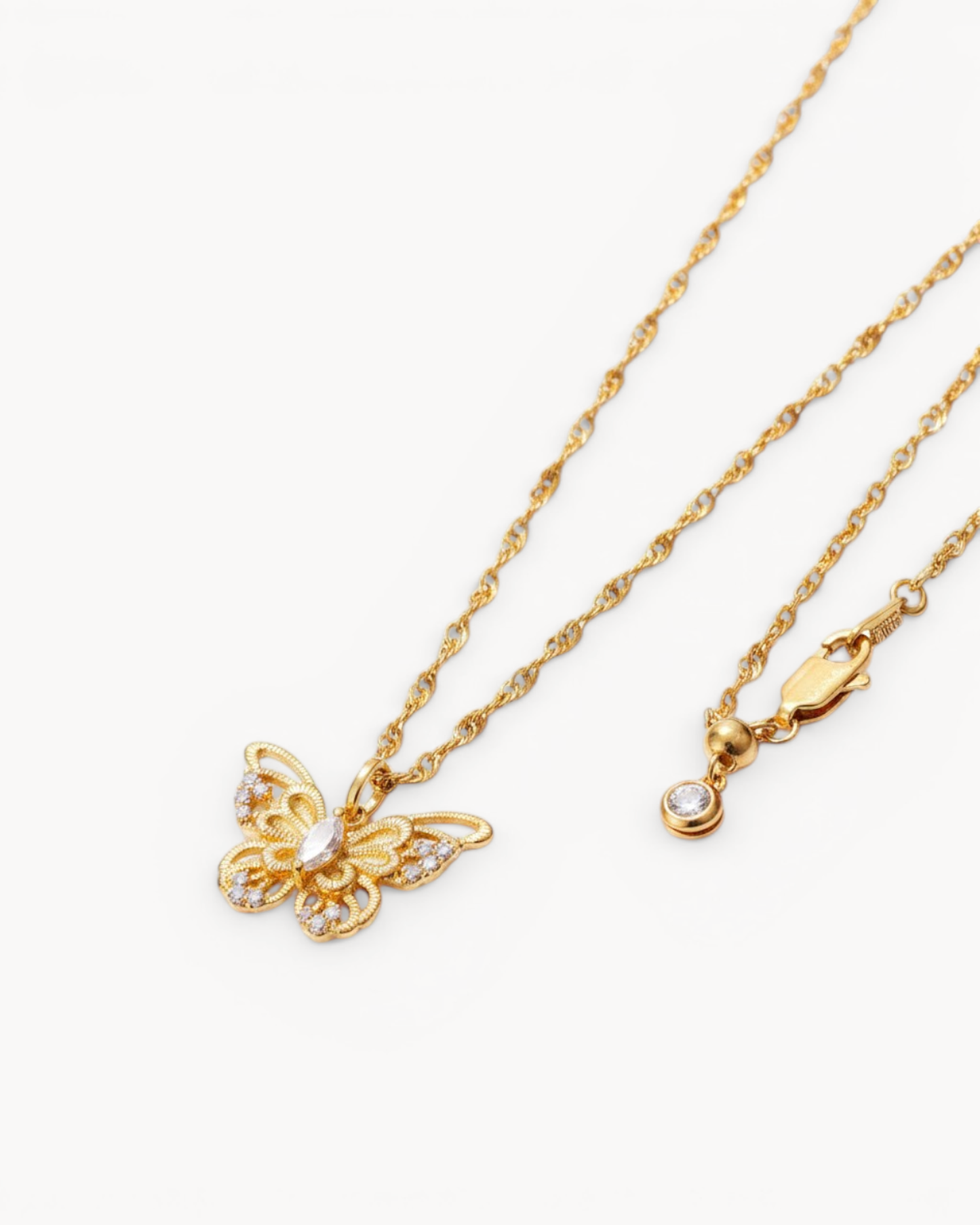 Close-up detail of Theiaura Gilded Butterfly Pendant Necklace