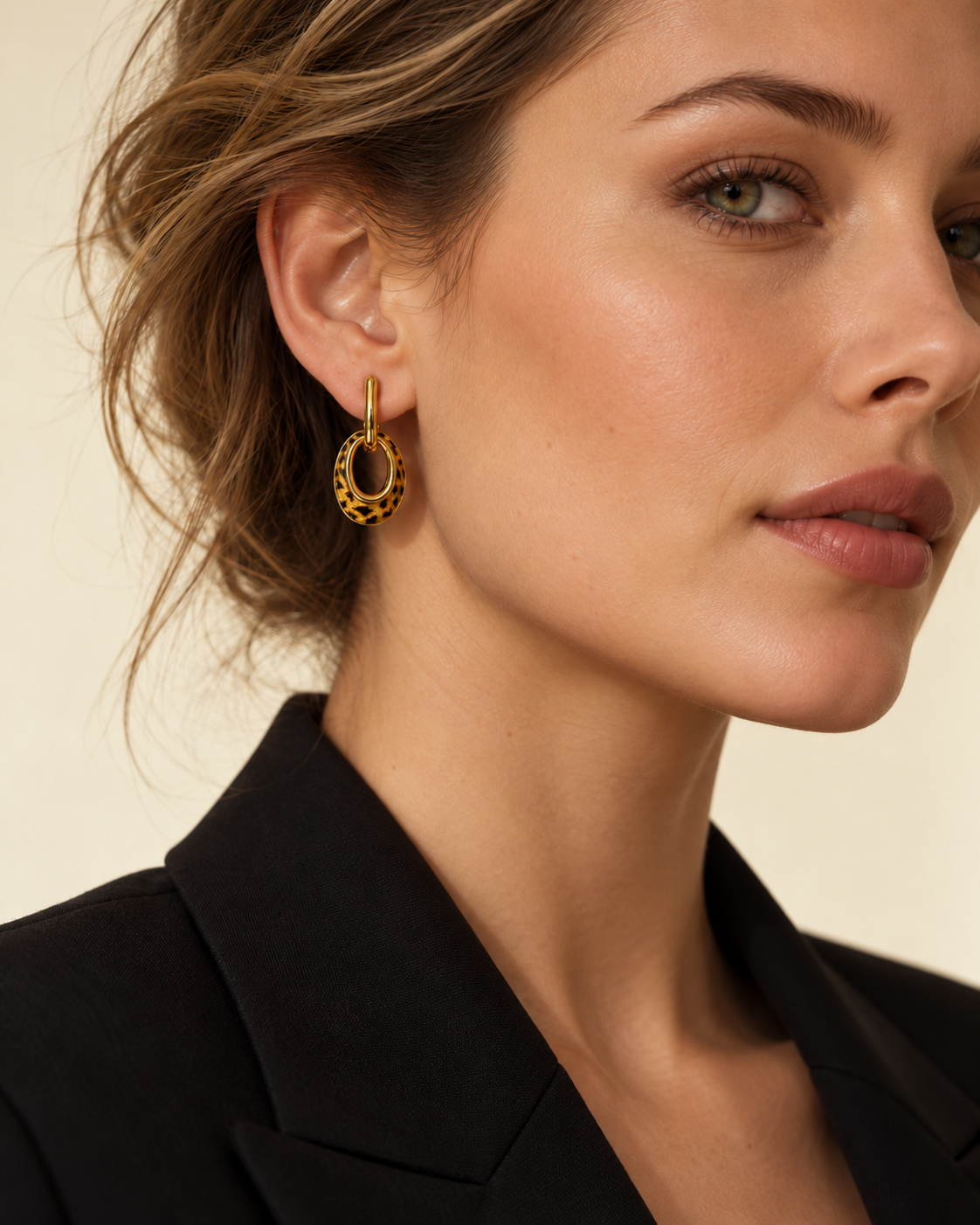Theiaura Leopard Loop Hoop Earrings worn with a black blazer