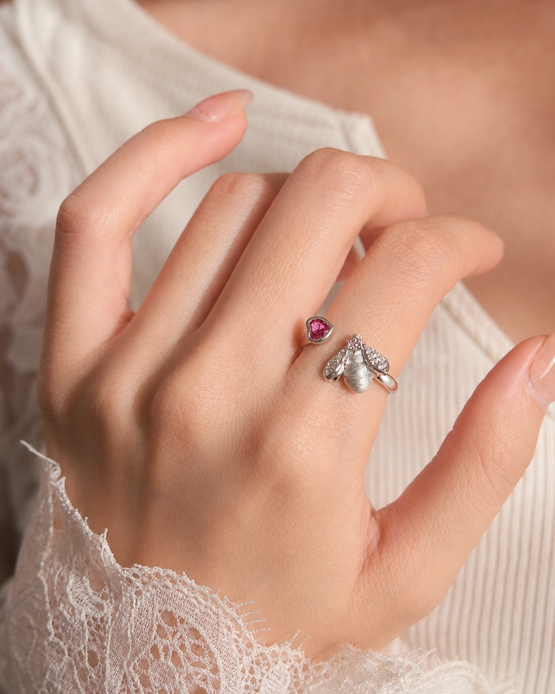 Theiaura Meliora Bee Open Ring in Silver worn on hand