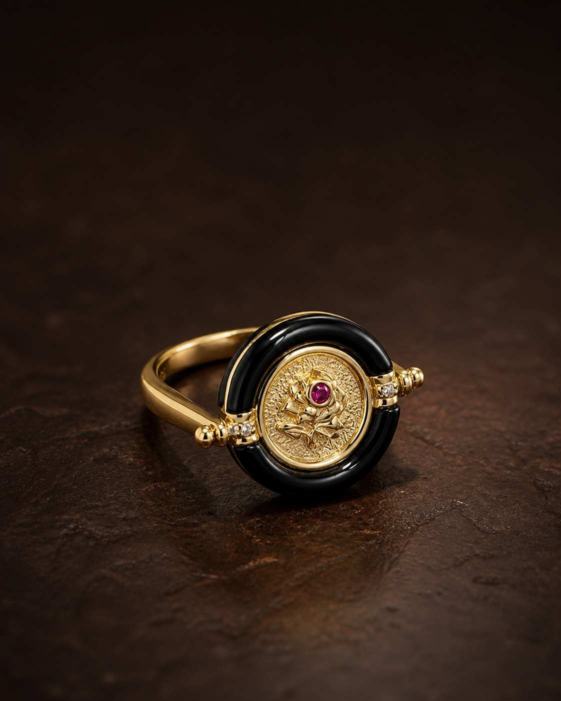 Theiaura Rosalia Medallion Ring on a dark warm-brown surface