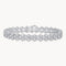 Pulsera de tenis Theiaura de moissanita redonda de 4 puntas (11,4-13,2 ct. total)