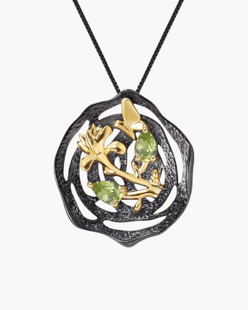 Theiaura Nocturne Aviary Pendant Necklace with natural peridot