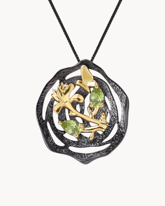 Theiaura Nocturne Aviary Pendant Necklace with natural peridot