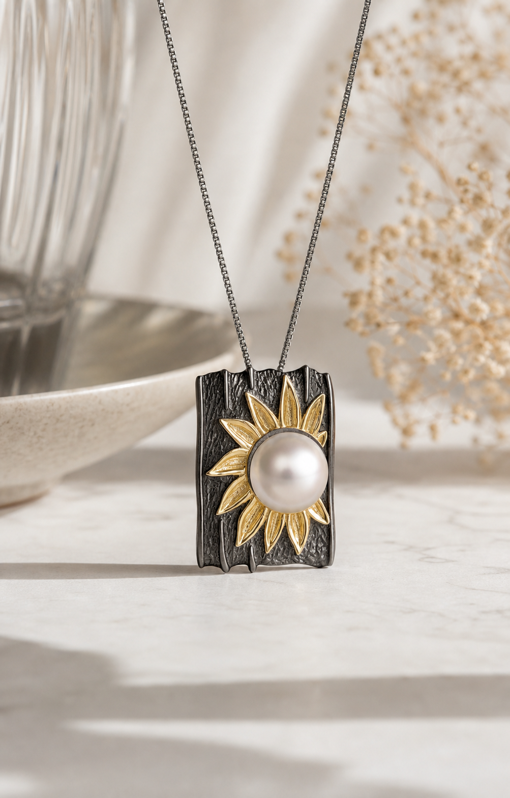 Theiaura Solar Bloom Pearl Pendant Necklace in a contemporary jewelry scene
