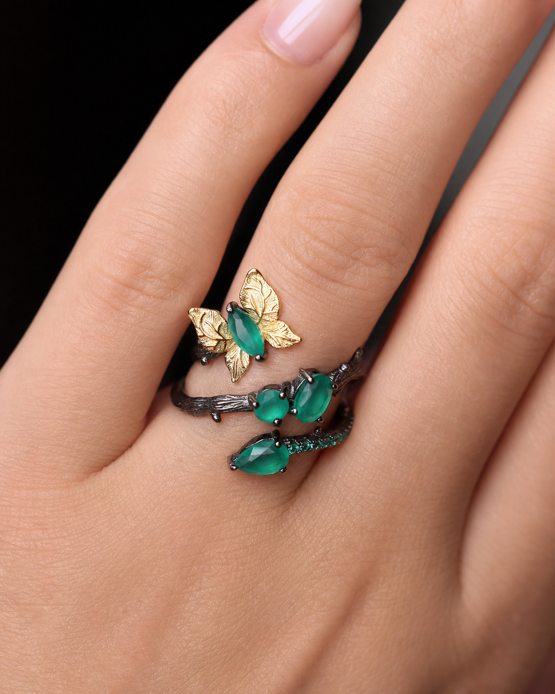 Theiaura Verdant Butterfly Ring worn by a woman